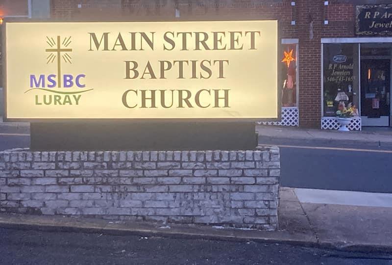 Main Street Baptist Church Sign (lit up at dusk)